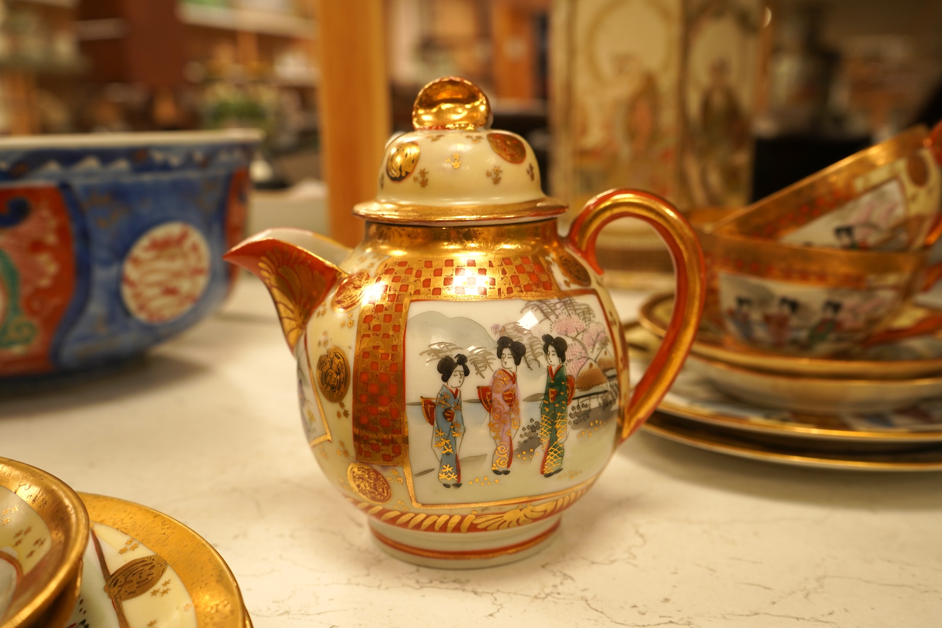 A Japanese Kutani eggshell nine cup part teaset